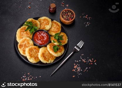 Potato Pancakes. Vegetable fritters. Latkes in frying pan. Potato Cakes. Vegetable fritters, latkes, hash browns. Vegetable pancakes