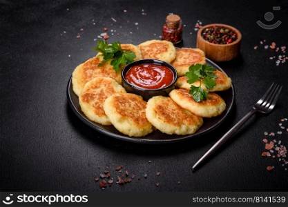 Potato Pancakes. Vegetable fritters. Latkes in frying pan. Potato Cakes. Vegetable fritters, latkes, hash browns. Vegetable pancakes