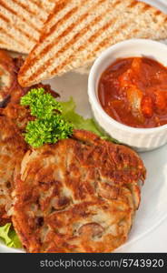 potato pancakes with toast bread and jam closeup