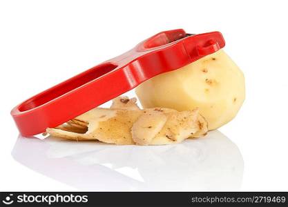potato peeler with peeled potato