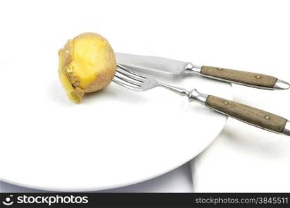 Potato peeling on table