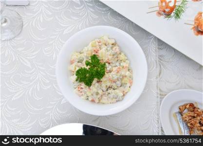 potato salad with cucumbers, pickled peas and mayonnaise