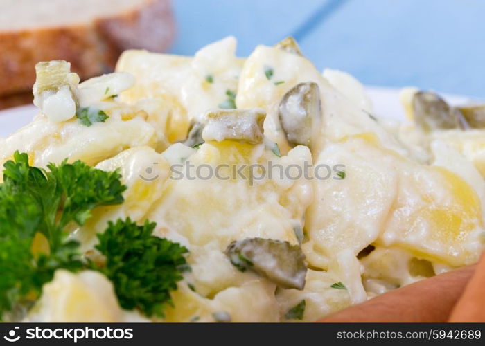 Potato salad with sausage and mustard. Potato salad with sausage and mustard.