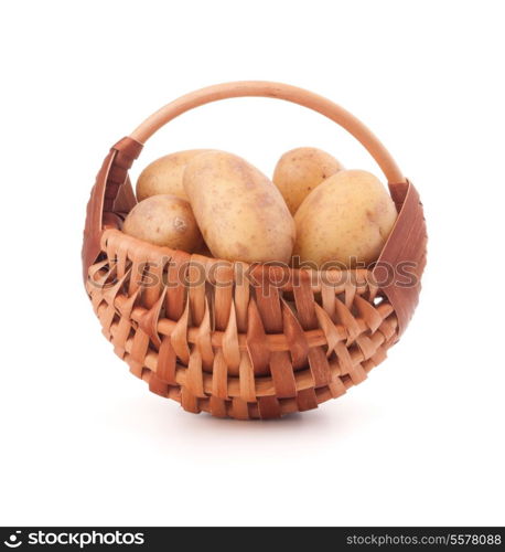 Potato tuber in wicker basket isolated on white background