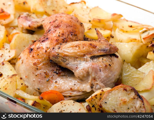 Potato with a hen on grill .Whole Roast chicken