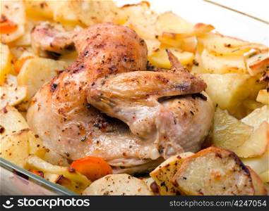 Potato with a hen on grill .Whole Roast chicken