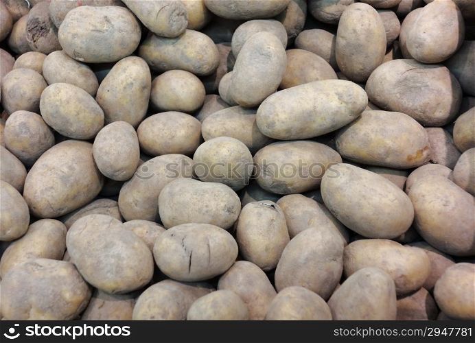 potatoes in market place as food background
