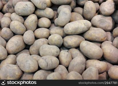 potatoes in market place as food background