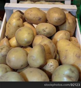 Potatoes inside Wooden Box for Sale in Market