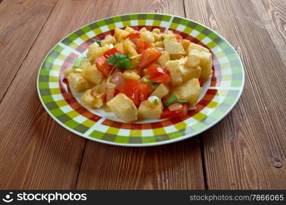 Potatoes O&rsquo;Brien - dish of pan-fried potatoes along with green and red bell peppers.