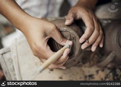 Pottery workshop, the process of making ceramic tableware, women&rsquo;s hands
. Pottery workshop, the process of making ceramic tableware