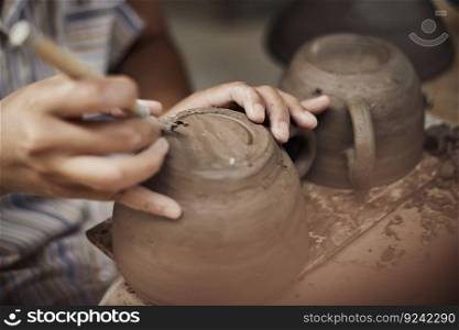 Pottery workshop, the process of making ceramic tableware, women&rsquo;s hands
. Pottery workshop, the process of making ceramic tableware