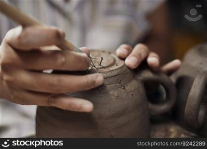Pottery workshop, the process of making ceramic tableware, women’s hands . Pottery workshop, the process of making ceramic tableware