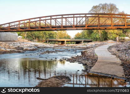 Poudre River and newly constructed whitewater park in downtown of Fort Collins, Colorado, fall scenery with a low water flow