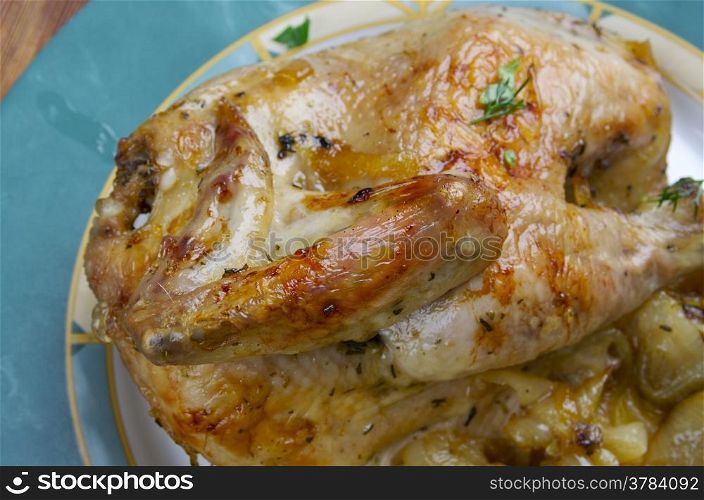Poulet aux oignons - French roasted chicken onion gravy. farm-style