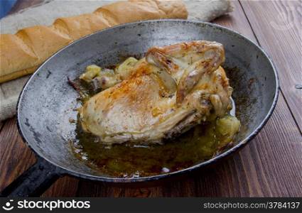 Poulet aux oignons - French roasted chicken onion gravy. farm-style