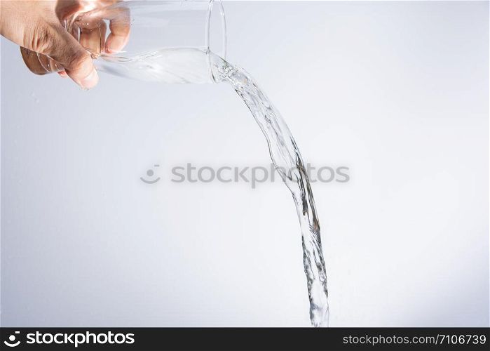 Pour water out of the glass
