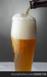 pouring a bavarian wheat beer