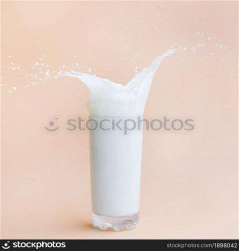 pouring milk out glass. Resolution and high quality beautiful photo. pouring milk out glass. High quality beautiful photo concept