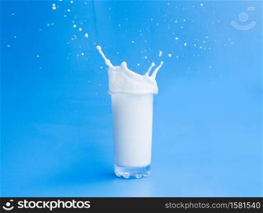 Pouring milk out of glass