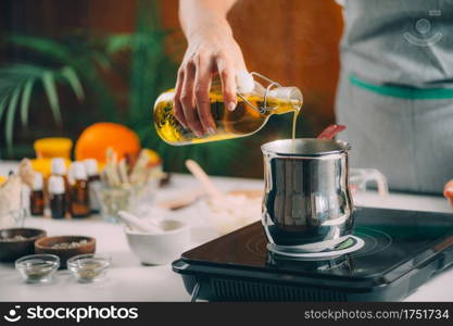 Pouring Natural Oil, Making Homemade Soap.