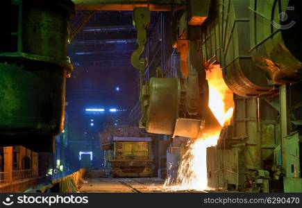 Pouring of liquid metal in a steel plant