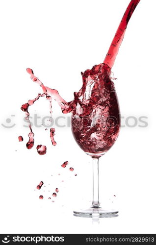 pouring red wine in goblet, isolated on white