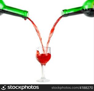 pouring red wine in goblets isolated on white