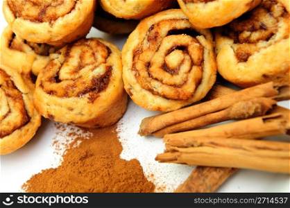 Powdered and stick cinnamon with freah baked mini cinnamon rolls. Cinnamon And Rolls