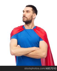 power and people concept - man in red superhero cape over white. man in red superhero cape