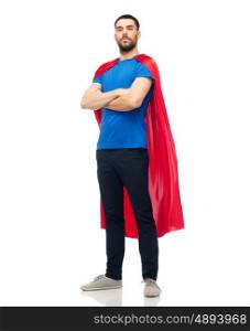 power and people concept - man in red superhero cape over white. man in red superhero cape