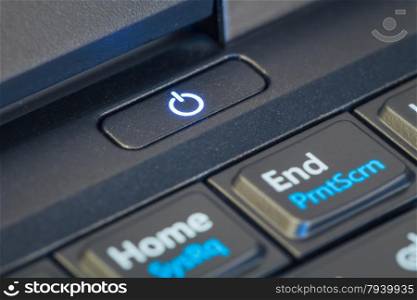 power button icon sign on notebook computer