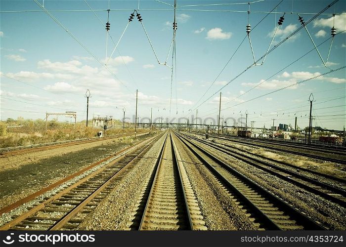 Power cables over railroad tracks