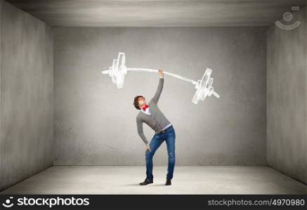 Power in good idea. Confident businessman lifting above head barbell with light bulbs