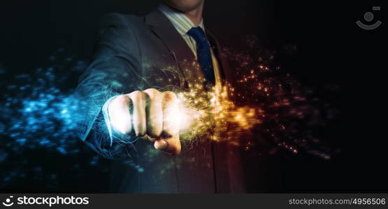 Power in hands. Businessman holding lightning in fist. Power and control