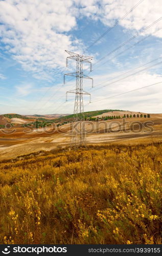 Power Line on the Plowed Field in Spain