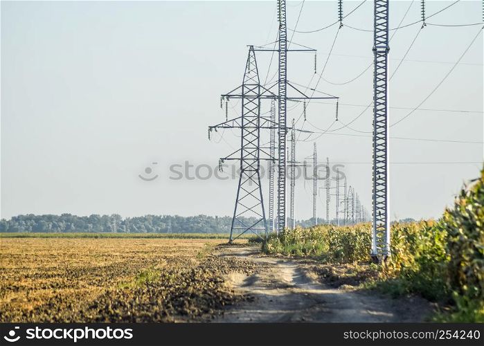 Power line support, insulators and wires. Appearance of a design.. Power line support