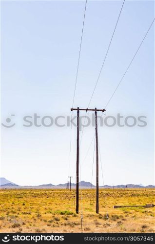 Power lines in Rural Grassland Farming Area of the Karoo Semi-desert in South Africa