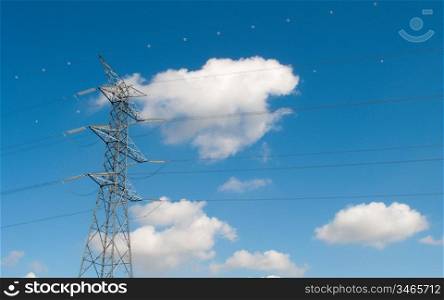 Power lines under a pretty blue sky