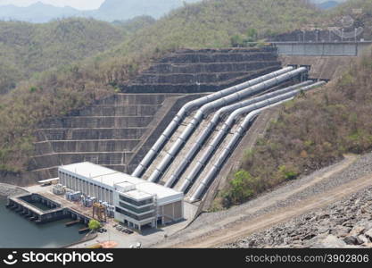 Power plant. Electricity from hydropower dams station located below the dam.