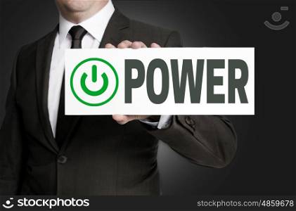 power sign is held by businessman. power sign is held by businessman.