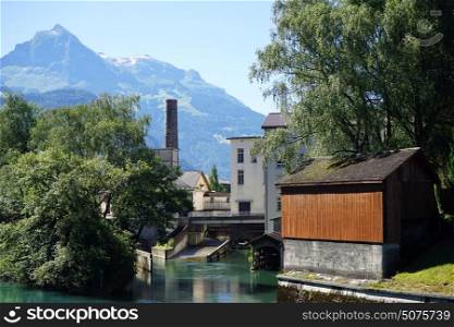 Power station and river in Galgenen in Switzerland