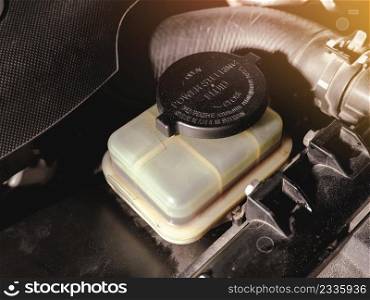 Power steering fluid reservoir of the hydraulic steering wheel in the car