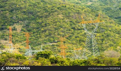 Powerlines On Hillside. Powerlines on the hillside of the Chicoasen Dam, Chiapas Mexico