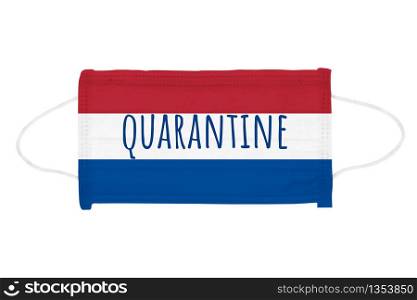 PP non-woven disposable medical face mask isolated on white background. Quarantine lettering on medical mask toned in Netherlands flag colors. PP non-woven disposable medical face mask isolated on white background