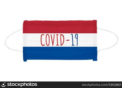 PP non-woven disposable medical face mask isolated on white background. Covid lettering on medical mask toned in Netherlands flag colors. PP non-woven disposable medical face mask isolated on white background