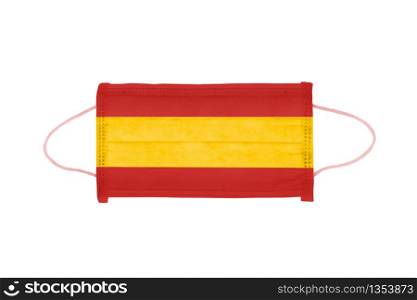 PP non-woven disposable medical face mask isolated on white background. Medical mask toned in spain flag colors.. PP non-woven disposable medical face mask isolated on white background