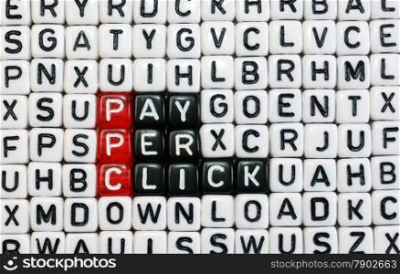 PPC text , pay per click written on red black and white cubes