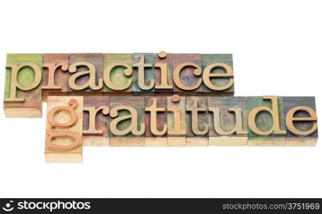 practice gratitude - isolated text in letterpress wood type printing blocks stained by color inks