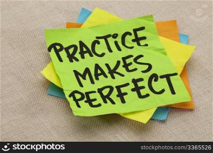practice makes perfect - a motivational slogan on a green stocky note